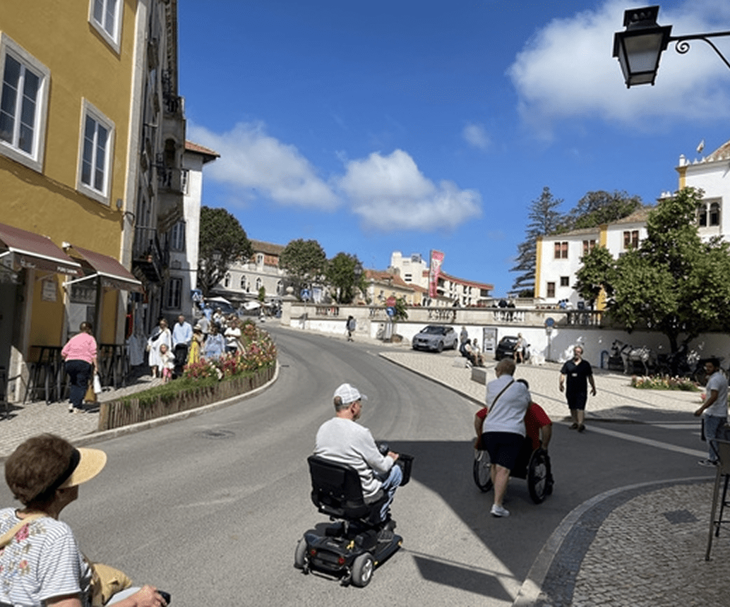 Street scene with people and blue sky
